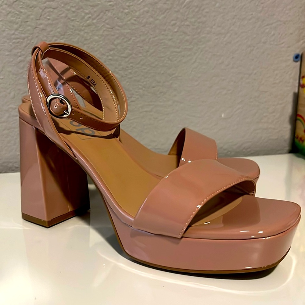 Soft pink platform heels.